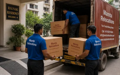 Movers loading cartons on a Thane society podium — Mamta Relocations